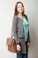 Student in classic casual comfortable clothes with fashionable backpack