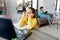 Student girl with laptop learning online at home