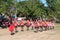 Student group of each school is walking in parade.