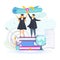 Student guy and girl stand on pile of books and hold diploma above their heads