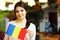 Student holding flag of Romania