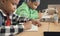 Student in international preschool writing a book together in Elementary School Class, Pupils enjoying studying in classroom