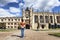 Student at the Kings Gate and chapel, Trinity