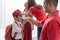 Student kiss his parent`s hand before going to school