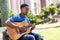 Student playing guitar