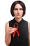 A student with a red ribbon isolated on a white background. Solidarity with people with AIDS. Health awareness concept.