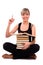 Student is sitting with stack of book