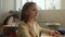 Student studying at elementary school class. Girl sitting at desk during lesson