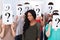 Student surrounded by classmates holding question mark signs