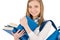 Student teenager woman with schoolbag hold books