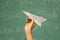 Student about to throw paper aeroplane
