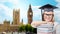 Student in trencher cap with books over london