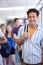 Student, university and backpack in corridor, smile and ready for class, man and happy. Portrait, education and