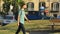 Student walking down beautiful street in Naples city center, tourism, travel