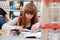 A student at work in laboratory of chemistry studies the records