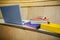 Students books and laptop in an auditorium