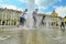 Students celebrating the last school day taking ritual shower in downtown fountain