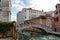 Students crossing a bridge at Ca Foscari