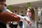 students greeting new normal coronavirus handshake and elbow bumping