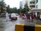 Students have fun on a rain day on flooded Mumbai Road