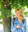 Students life concept. Take minute to relax. Break for snack. Student eat apple fruit nature background defocused