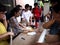 Students line up to submit their application form for the college entrance exam called UPCAT of the state university, University o