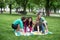 Students play a game in the park twister