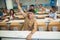 Students raising hands in class on lecture
