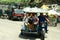 Students riding a tricycle to get to school