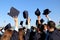 Students throwing graduation hats