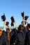 Students throwing graduation hats