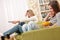 Students - Two female teenager watching television