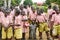 Students in Uganda, school boys and girls of Ugandan school. One school boy comes with little brother.