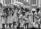 Students with umbrellas on rainy ground in Srilanka,Asia