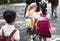 Students walking crossing school road