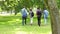 Students walking on the grass