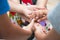 Students young people hands putting their together like show success teamwork or partnership and relationship of friends, Stack of