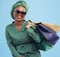 Studio bag, shopping and happy customer, black woman or client excited for holiday fashion spree, sales or mall market