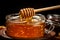 Studio close up captures a honey jar with its wooden dipper