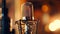 Studio condenser microphone with blurred background and audio mixer musical instrument concept