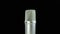 Studio Condenser Microphone Rotates on a Black Background