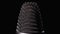 Studio Condenser Microphone Rotates on Black Background