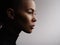 Studio photo of an african american female model face, profile