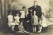 Studio photograph from the period 1925-1930 of a young family couple with their 6 small children, Antwerp