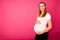 Studio photography of a beautiful pregnant woman