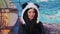 Studio portrait of brunette girl in hat panda