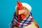 Studio portrait of a chicken or hen wearing knitted hat, scarf and mittens. Colorful winter and cold weather concept