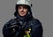 Studio portrait of firefighter dressed in uniform.