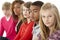 Studio Portrait Of Five Teenage Friends Standing I