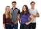 Studio Portrait Of Group Of Teenage Friends Standing Against White Background